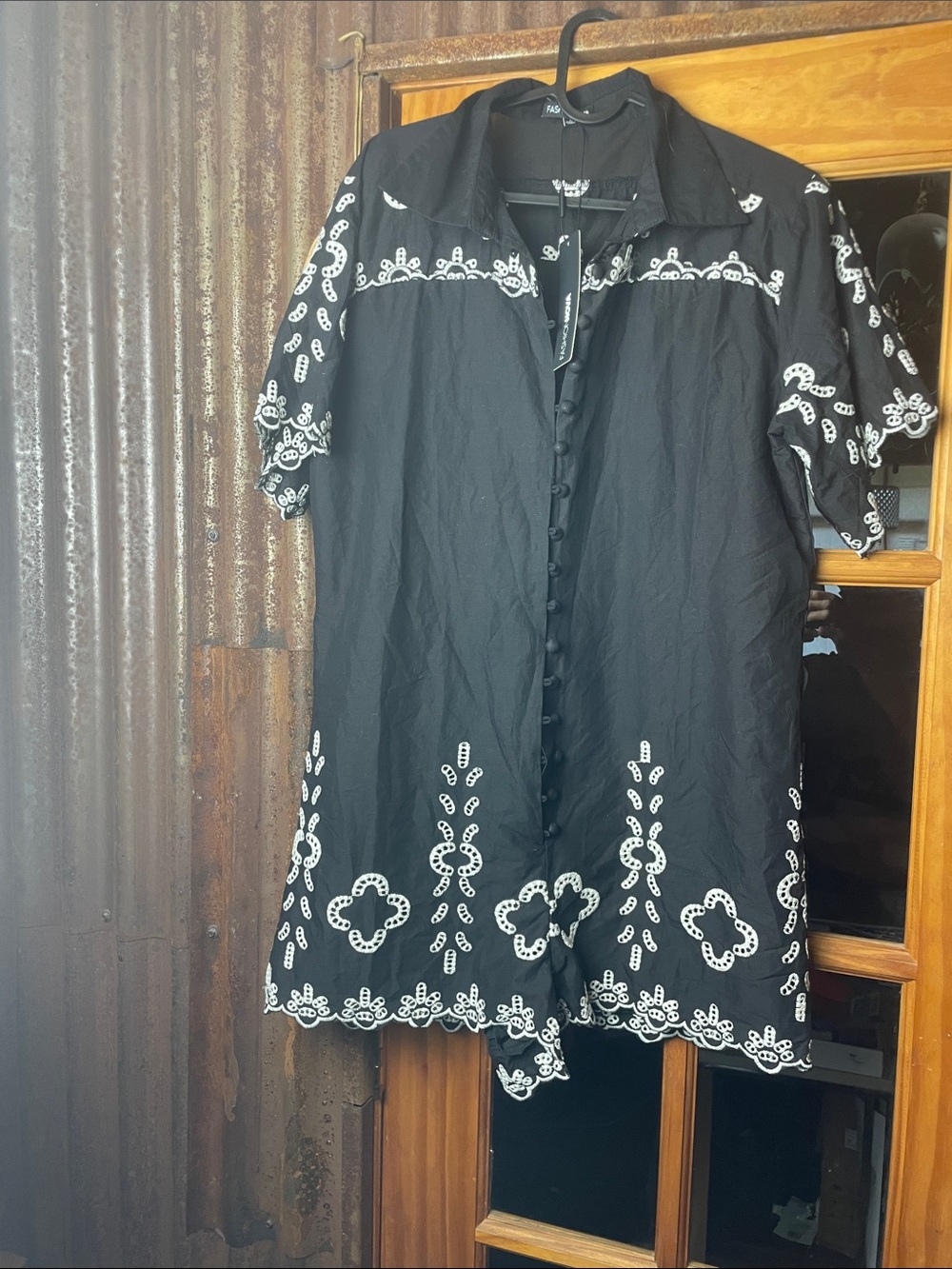 Fashion Nova Black and White Embroidered Romper with covered buttons. Size L